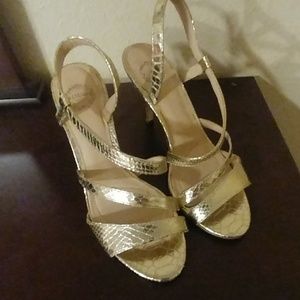 Gold snake print slingback heels